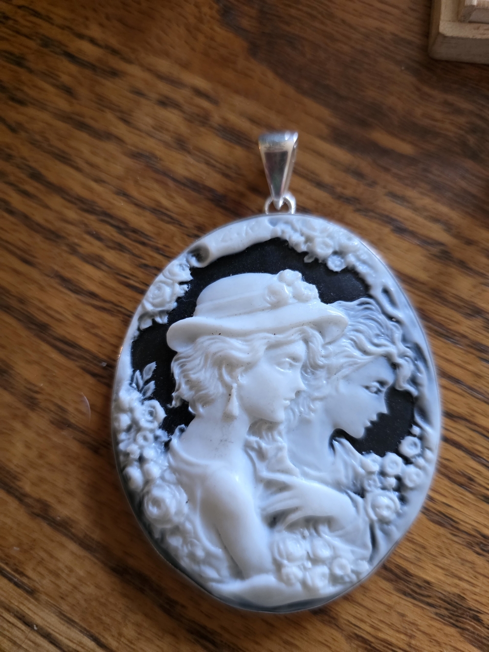 Vintage-Inspired Black and White Cameo Pendant set In Sterling Silver